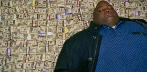 Pile of money as bed